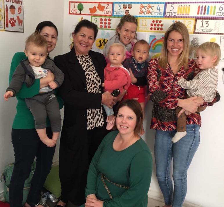 Babies and toddlers and their moms  at music class in Constantia